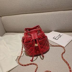 Solid color purses with gold chain belt attached